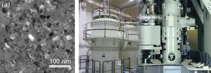 Fig. 2 (a) TEM image of the present polycrystalline Fe film. (b) Photograph of the UHV-STEM JEM-1000K RS at Nagoya University.